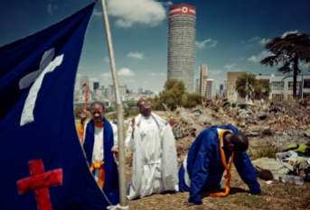 Al Jazeera feature on the Ponte Building and surrounding areas in Johannesburg CBD, South Africa. Prayers of the Christian faith, pray on Yeoville-koppies. Ponte can be seen in the background . Picture: Cornel van Heerden/Al Jazeera